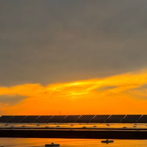 rain clouds over solar panels
